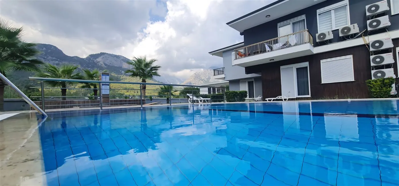 Swimming pool with panoramic mountain view - Palmiye Home Göynük